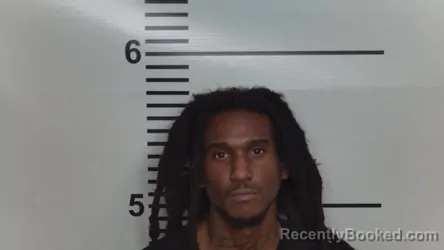Mugshot of TRAVIS SHAQUILLE RAWLINS booked in Jefferson County, Kentucky on June 8, 2026