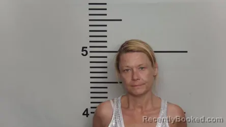 Mugshot of KELLI M JOHNSON booked in Jefferson County, Kentucky on June 12, 2026