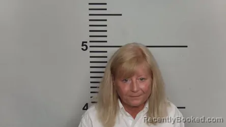 Mugshot of JANICE LEE METCALFE booked in Jefferson County, Kentucky on June 13, 2026
