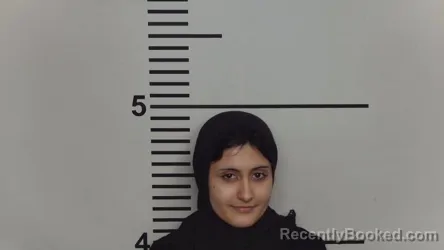 Mugshot of ZAHRAA MANWRALSKER booked in Jefferson County, Kentucky on June 15, 2026