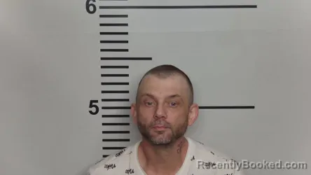 Mugshot of ERIC LEE SPENCER booked in Jefferson County, Kentucky on June 15, 2026