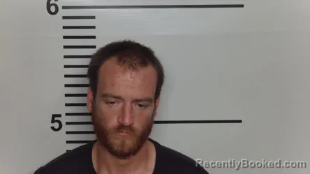 Mugshot of JUSTIN R THOMAS booked in Jefferson County, Kentucky on June 25, 2026