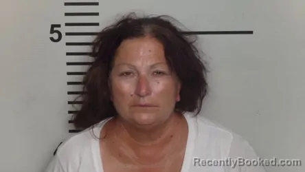 Mugshot of Tina Louise Calhoun booked in Jefferson County, Kentucky on August 11, 2026