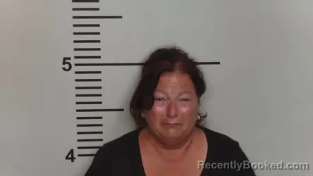 Mugshot of Tina Louise Calhoun booked in Jefferson County, Kentucky on September 23, 2026
