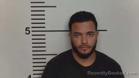 Mugshot of Carlos Castillo-Melo booked in Jefferson County, Kentucky on October 9, 2026
