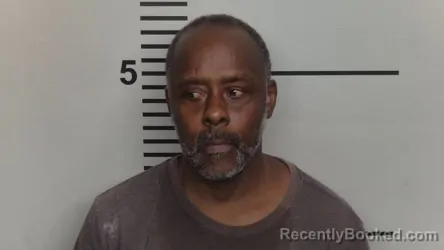 Mugshot of Darrell Lamont Miles booked in Jefferson County, Kentucky on October 13, 2026