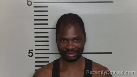 Mugshot of Issa Omari Kisa booked in Jefferson County, Kentucky on October 24, 2026
