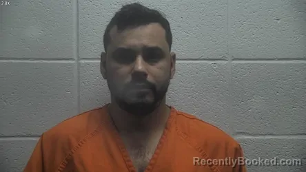 Mugshot of YEALBER CALDERA COLMENAREZ booked in Jessamine County, Kentucky on May 11, 2026