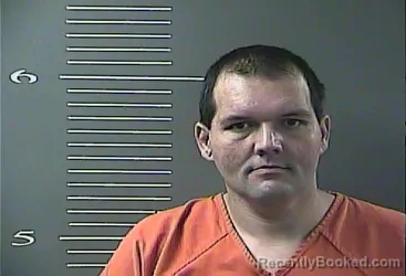 Mugshot of MATTHEW MERLIN MULLINS