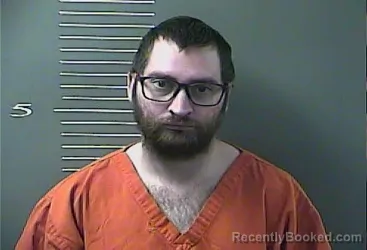 Mugshot of RYAN BUSH