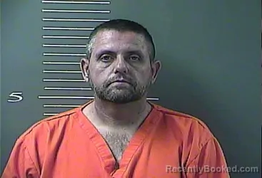 Mugshot of DENNIS Ray MOORE booked in Johnson County, Kentucky on April 1, 2026