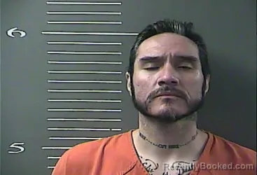Mugshot of ADAM VICTORIANO HUIZAR booked in Johnson County, Kentucky on April 8, 2026