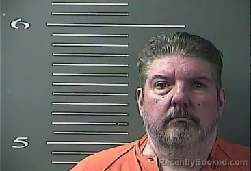 Mugshot of John Legrande Carroll booked in Johnson County, Kentucky on October 26, 2026