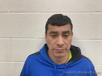 Mugshot of EDUARDO NMI REYNOSO-CALIXTO