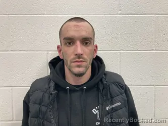 Mugshot of TRAVIS AUSTIN DECKER