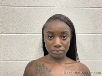 Mugshot of AMINA DENISE TOURAY booked in Kenton County, Kentucky on April 28, 2026
