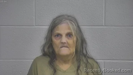 Mugshot of DORA M CURRY