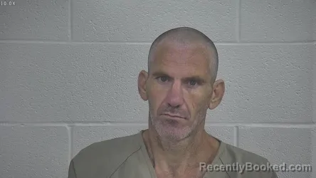 Mugshot of Dennis Helton booked in Laurel County, Kentucky on October 24, 2026