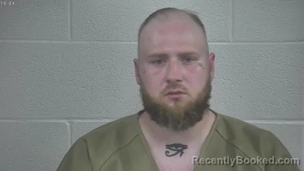 Mugshot of DUSTIN SCHMITTAUER booked in Laurel County, Kentucky on July 1, 2026