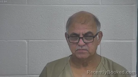 Mugshot of NAJAT MALIK booked in Laurel County, Kentucky on May 10, 2026