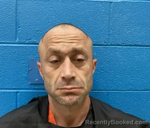 Mugshot of TRAVIS PAUL COOK booked in McDowell County, North Carolina on June 7, 2026