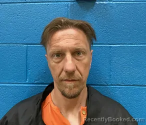 Mugshot of MATTHEW S REVIS booked in McDowell County, North Carolina on May 20, 2026