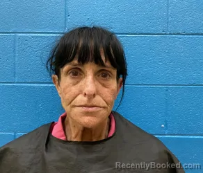 Mugshot of KIMBERLY SUZANNE MILLS booked in McDowell County, North Carolina on May 1, 2026