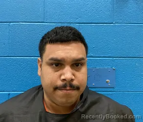 Mugshot of Andres Padilla Belli booked in McDowell County, North Carolina on October 5, 2026