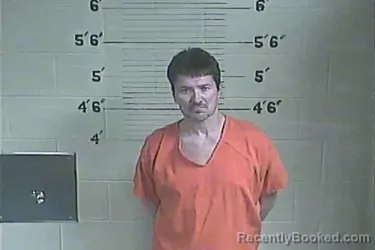 Mugshot of Arnett R Mullins