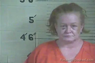 Mugshot of Sarah Muncy booked in Lee County, Kentucky on March 11, 2026