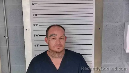 Mugshot of Dustin Burke booked in Leslie County, Kentucky on August 18, 2026