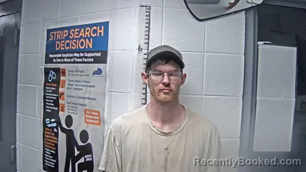 Mugshot of TRAVIS OWENS booked in Letcher County, Kentucky on April 15, 2026