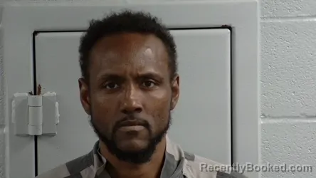 Mugshot of KIYAM SANTO