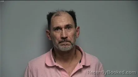 Mugshot of DONALD G REAVIS