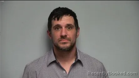 Mugshot of GARRETT T HINA