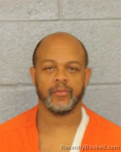 Mugshot of DAVENON ALEXANDER FARMER