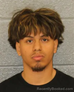 Mugshot of JOSUE ROMMEL REYES-GUITERREZ