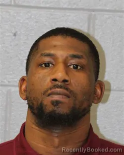 Mugshot of JUSTIN CHADWICK HUGHES