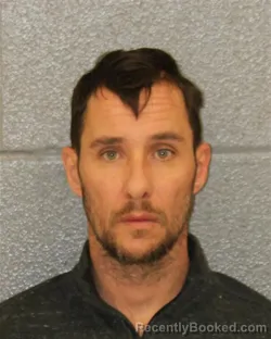 Mugshot of TRAVIS ROY CARPENTER