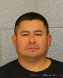 Mugshot of SANTIAGO DEAQUINO TOMAS