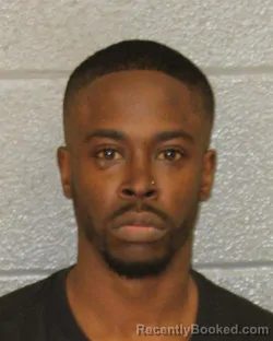 Mugshot of JOJO SYLVESTER WHITE booked in Mecklenburg County, North Carolina on March 20, 2026