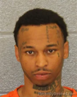 Mugshot of JAYLAN DEANDRE ROBINSON booked in Mecklenburg County, North Carolina on March 20, 2026