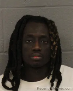 Mugshot of CHEIKOUNA MBACKE booked in Mecklenburg County, North Carolina on March 21, 2026