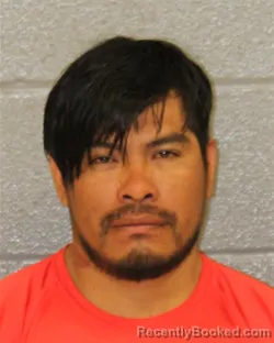 Mugshot of AGUSTIN SANTOS-SANTOS booked in Mecklenburg County, North Carolina on March 21, 2026