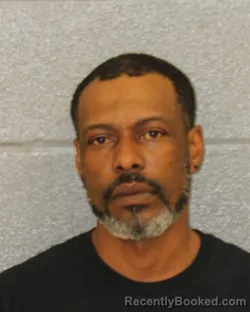 Mugshot of JOHN HENDERSON IVEY booked in Mecklenburg County, North Carolina on March 21, 2026