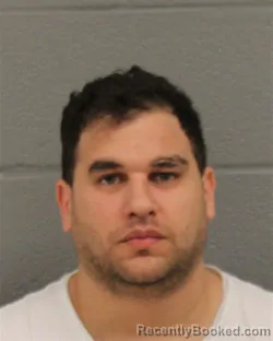 Mugshot of RENE VIRGILIO GARCIA-PILARTE booked in Mecklenburg County, North Carolina on March 21, 2026