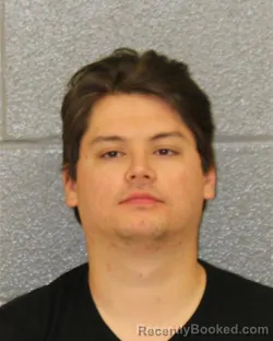 Mugshot of CHRISTIAN MICHAEL RENAUD booked in Mecklenburg County, North Carolina on March 21, 2026