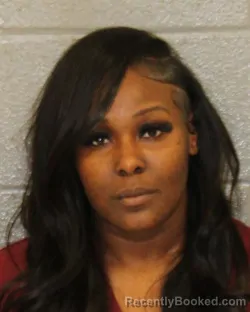 Mugshot of NATICA NASJNAE'NAHARE CLOUD booked in Mecklenburg County, North Carolina on March 22, 2026