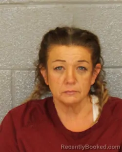 Mugshot of AMY DENISE CARRIKER booked in Mecklenburg County, North Carolina on March 22, 2026