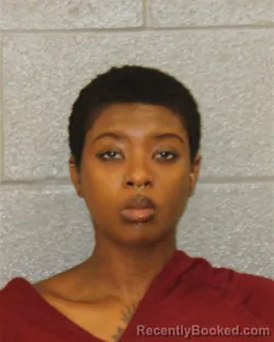 Mugshot of APRIL MICHELLE DAVIES booked in Mecklenburg County, North Carolina on March 22, 2026